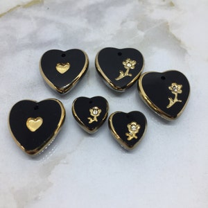 Vintage glass black heart embossed, engraved pendant, drop with gold rose accent, made in West Germany circa 1970's