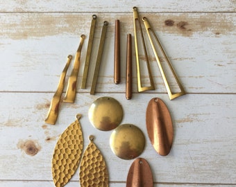 Assorted brass stampings, drops, teardrops , decorative brass charms, pieces