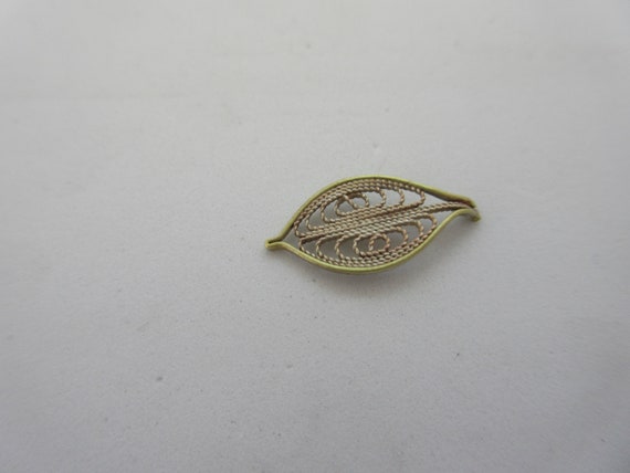 Filigree leaf best sale