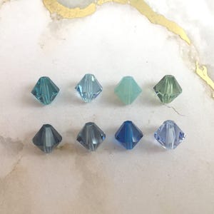 Swarovski 8mm Xilion crystal Bicone bead, Article 5328, 8 colors available; assortment #4.