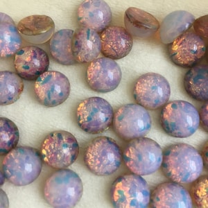 Vintage 10mm opal glass cabochon, made in West Germany and Czech Republic between 1950 and 1970; 6 colours sold in various quantities. Silver opal
