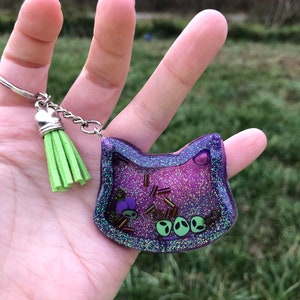 Handmade alien themed glitter shaker keychains, phone grips, Christmas, stocking stuffer, anxiety, fidget toy, spaceship, outer space, space