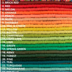 May include: A color palette of flat disc beads in a variety of colors, including red, orange, yellow, green, and blue. The image is labeled with the names of the colors, such as "Glitter Rainbow," "Brick Red," and "Sky Blue."