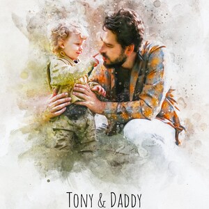 May include: A watercolor painting of a father and son. The father is wearing a plaid shirt and the son is wearing a green jacket. The father is looking at the son and the son is looking at the father. The text "TONY & DADDY 20.04.2021" is written below the image.