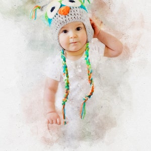 May include: A watercolor painting of a baby wearing a gray and white owl hat with colorful yarn strings. The baby is wearing a white shirt and the name "Jack" is written below the image.