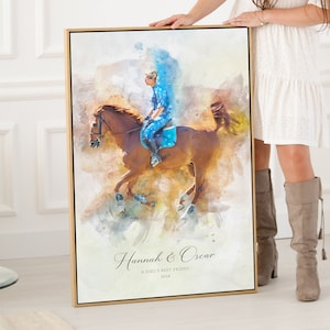 May include: A watercolor painting of a girl riding a brown horse. The painting is set against a light brown background with splashes of blue and yellow watercolor. The text "Hannah & Oscar" is written in cursive at the bottom of the painting, along with the words "A girl's best friend" and the year "2024".
