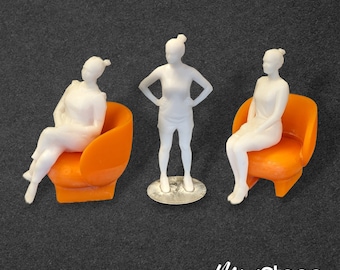 Janet - Set of Three Low Poly Scale Figures of a Woman Sitting and Standing with a Bun.