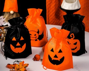 4 pcs Chauve-souris citrouille non tissé avec cordon de serrage Sacs cadeaux Sacs de bonbons et de bonbons Pochette de bonbons pour Halloween Party Favors Sac Fournitures de décoration