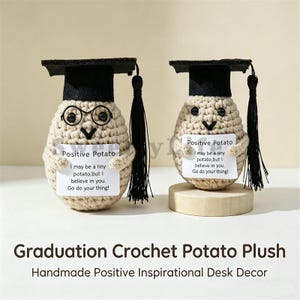 May include: Two handmade crochet potato plushies wearing black graduation caps and holding signs that read "Positive Potato." The signs include the text "I may be a tiny potato, but I believe in you. Go do your thing!"