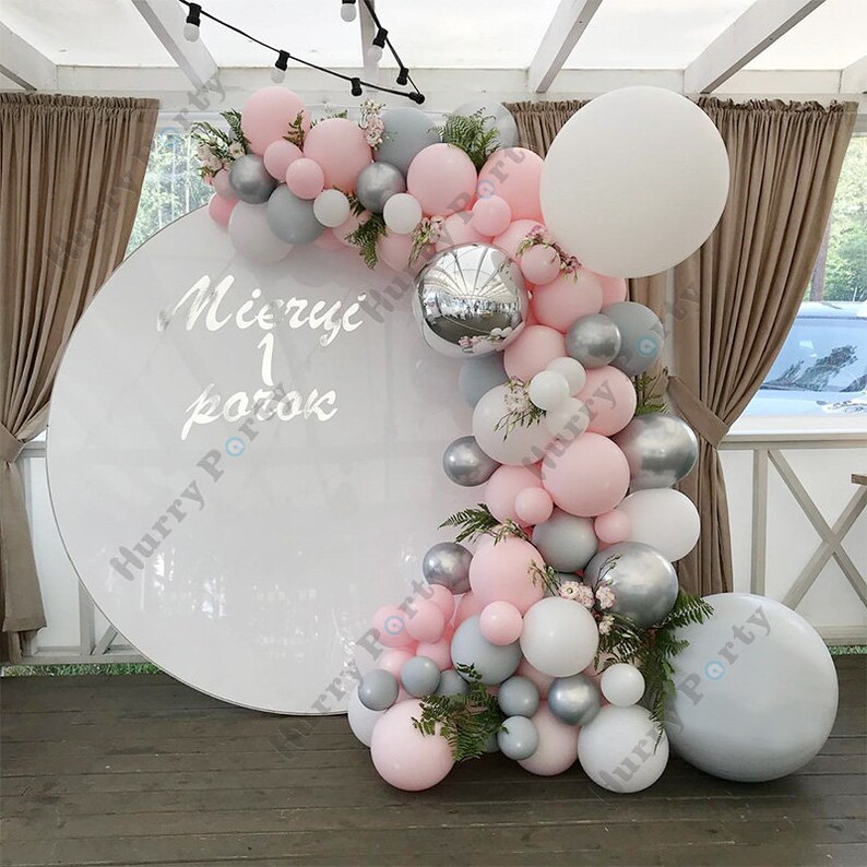 pink and grey balloon arch