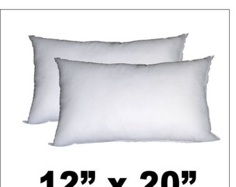May include: Two white pillow inserts, 12 inches by 20 inches.