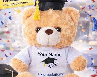 May include: A plush teddy bear wearing a graduation cap and a white t-shirt. The shirt has the text "Your Name" above a graduation cap graphic and the word "Congratulations". The image includes the text "For your 2026 GRADUATE!"