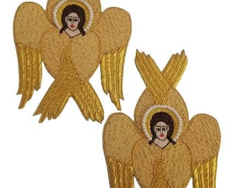 May include: Two gold embroidered angel patches. Each patch features a detailed face with a halo, surrounded by intricate gold thread wings and decorative elements. The patches are on a white background.