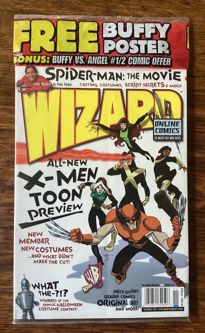 May include: A Wizard magazine cover featuring a red and yellow logo with the text "Wizard" in white. The cover features a cartoon illustration of the X-Men characters Wolverine, Cyclops, Rogue, and Jean Grey. The cover also features a smaller image of Tobey Maguire as Spider-Man from the movie Spider-Man. The cover text includes "All-New X-Men Toon Preview", "New Member, New Costumes", "What the-?! Winners of the Annual Halloween Costume Contest", "Price Guides, Graded Comics, Original Art and More!" and "Online Comics 50 Must-See Web Sites".