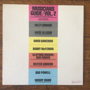 May include: A white poster with the title "Musicians Guide/Vol. 2" and a list of musicians including Billy Cobham, Mose Allison, David Sancious, Bobby McFerrin, Clifford Brown/Max Roach, Dexter Gordon, Bud Powell, and Woody Shaw.