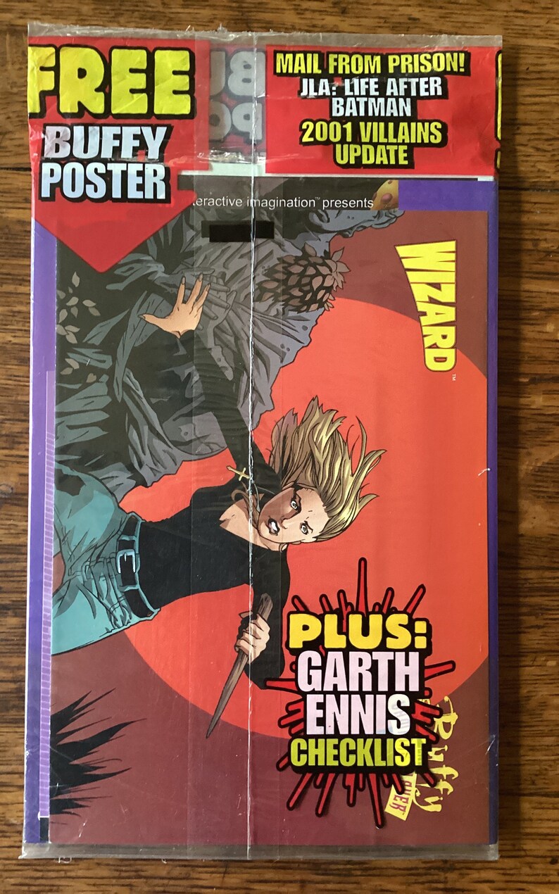 May include: A red and yellow comic book cover featuring a woman with blonde hair holding a knife. The cover text reads "FREE BUFFY POSTER" and "PLUS: GARTH ENNIS CHECKLIST".