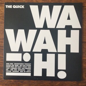 May include: Black and white vinyl record with the title "WA WAH H!" and the band name "THE QUICK" printed on the front. The record includes the song titles "Adventures Tonight", "Down the Wire", "We Can Learn", "From This Cry Baby", "Poise Side", "Two I Needed You", "You Needed Me", "The Big Decision", "Last Victim", "Sharon", "Bed of Nails".