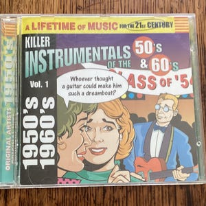 May include: A CD case with a colorful illustration of a band playing music. The text on the case reads "Killer Instrumentals of the 50's & 60's Ass of '54" and "Vol. 1".