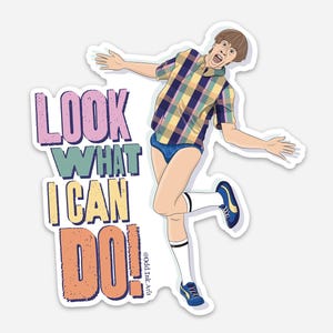 May include: A sticker featuring a cartoon illustration of a person in a plaid shirt, blue underwear, and athletic shoes. The sticker has the text "LOOK WHAT I CAN DO!" in colorful block letters.
