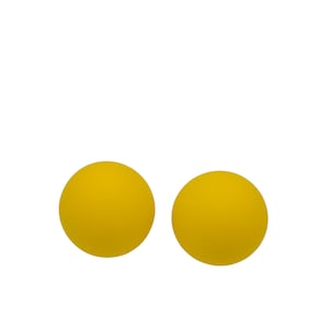 May include: Two bright yellow spheres are displayed against a white background. The spheres are evenly spaced and appear to be made of a smooth, matte material. The image is simple and clean, with the focus entirely on the two yellow objects.