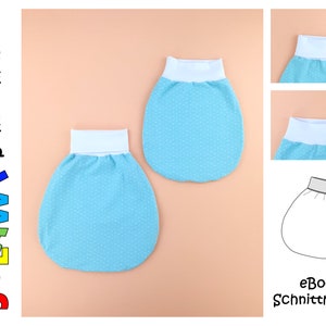 May include: A digital download pattern for making baby mittens. The pattern includes instructions for sewing a pair of blue and white polka dot mittens with a white cuff.