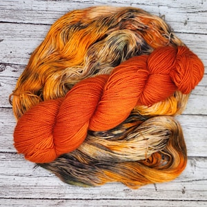 Hand dyed sock yarn - superwash merino, brown, burnt orange, blue, speckles