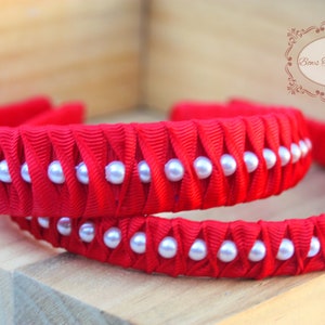 Red   Twisted with pearl woven grosgrain   ribbon headband. Your choice half or one inch wide. Pick your favorite color