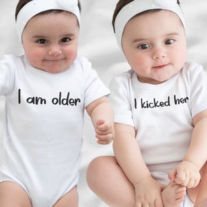 Funny Twin Onesies – &quot;I Am Older / I Kicked Her&quot; – Matching Baby Bodysuits for Twins – Cute Baby Shower Gift