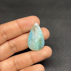 Peruvian Blue Opal Cabochon Size.    34x20 .MM 27 carat