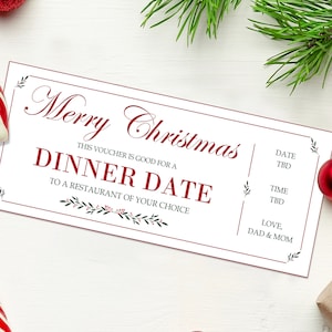 May include: A white gift certificate with red text that says "Merry Christmas" and "Dinner Date" with a red border. The text also says "This voucher is good for a dinner date to a restaurant of your choice." The text "Date TBD" and "Time TBD" is also included. The bottom of the certificate says "Love, Dad & Mom".