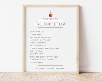 May include: A printable fall bucket list with a brown apple illustration. The list includes activities like decorating for fall, lighting a candle, taking a nature walk, having a caramel apple night, watching a scary movie, visiting a pumpkin patch, going for a drive, carving pumpkins, baking a fall treat, drinking hot chocolate or apple cider, cozying up and reading a good book, and going apple picking. The list is divided into three months: September, October, and November.