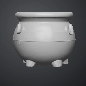 May include: A light gray, rounded cauldron with a wide, thick rim and a smooth, matte finish. The vessel features two small, molded handles on opposite sides near the top and rests on three short, sturdy feet at the base, showing a 3D printed texture.