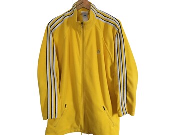 yellow adidas jacket with black stripes