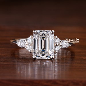 1.90 CTW Emerald Cut Moissanite Engagement Ring: Round & Marquise Side Stone