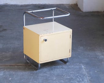 Tubular steel bedside table in Bauhaus style in ivory