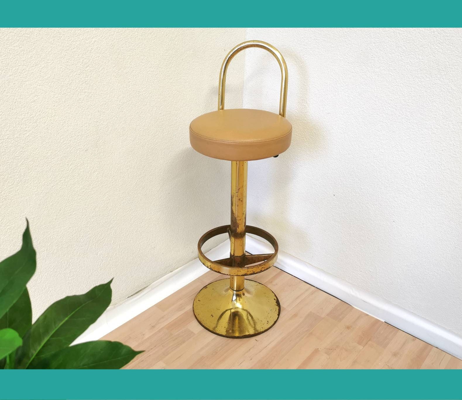 Brass plated stool.