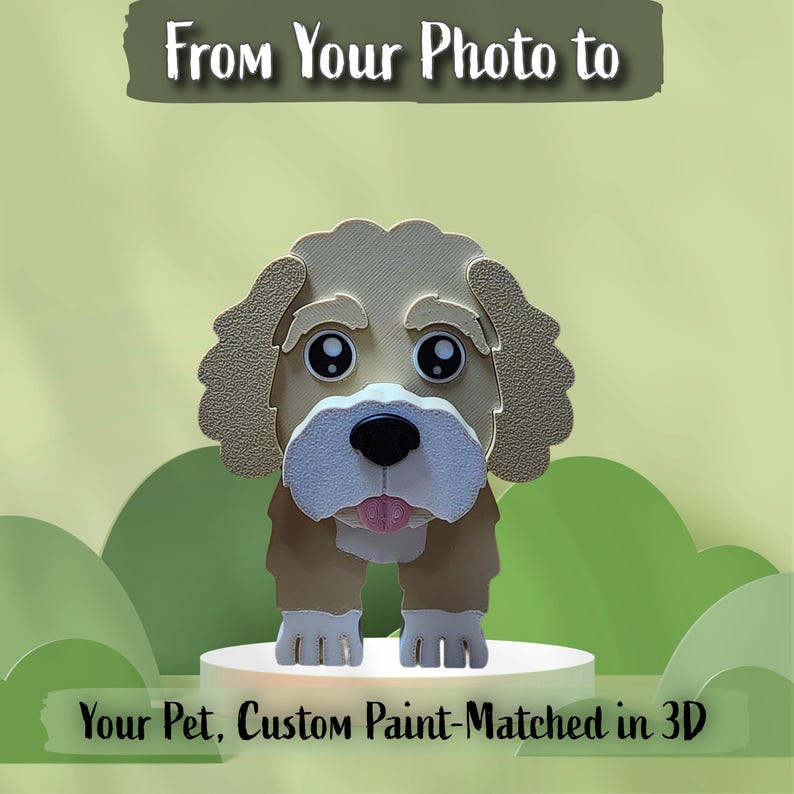 May include: A 3D-printed dog figurine with tan fur, white muzzle, and black nose. The text reads: From Your Photo to Your Pet, Custom Paint-Matched in 3D. The dog has large black eyes with white highlights and a small pink tongue showing.