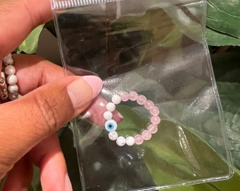 Manifest that lucky in love! Greek evil eye howlite and rose quartz ring.