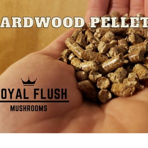 May include: A hand holding a pile of light brown hardwood pellets. The text "HARDWOOD PELLETS" is at the top of the image. Below the pellets is a logo with a crown and the text "ROYAL FLUSH MUSHROOMS".