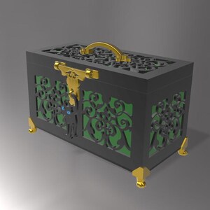 May include: A black decorative box with intricate cut-out designs and a gold handle. The box features gold accents on the corners and a gold clasp. A black cat silhouette with blue eyes is on the front. The interior is green.