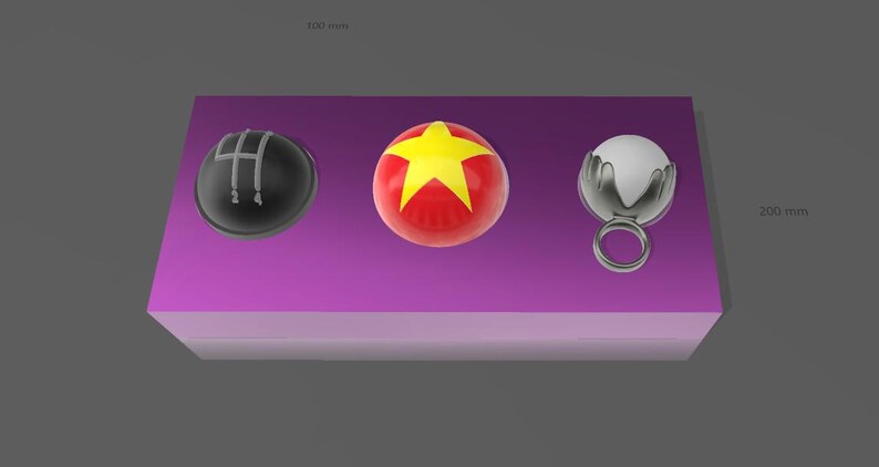 May include: Three spherical objects on a purple surface. The objects include a black sphere with a white gear shift pattern, a red sphere with a yellow star, and a silver sphere with a ring.