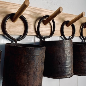 Rustic metal hanging storage pot