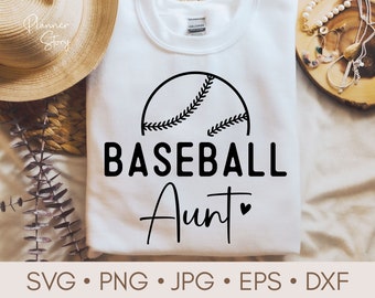 May include: White t-shirt with a black baseball graphic and the text "Baseball Aunt" with a small heart.
