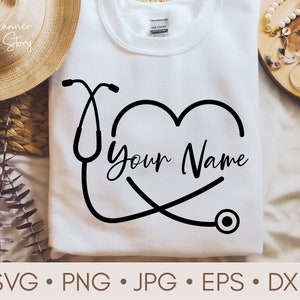 May include: White crewneck sweatshirt featuring a black stethoscope design forming a heart shape. The words "Your Name" are scripted inside the heart. The sweatshirt has the text "Planner Story" and file type icons at the bottom.
