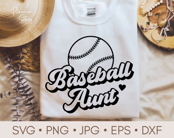 May include: A white t-shirt with a black baseball and the text "Baseball Aunt" in a retro font.