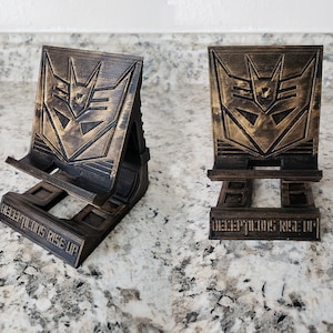 STL File only - 80&#39;s Cartoon themed Transformer/ Decepticon cellphone stand