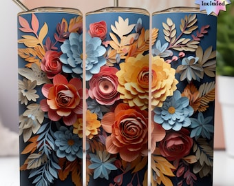 May include: A blue and white tumbler with a floral design. The flowers are made of paper and are in shades of orange, yellow, pink, and blue. The tumbler is perfect for holding hot or cold beverages.