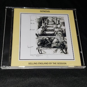 May include: A Genesis CD case with the album title "Selling England by the Pound" on a yellow background. The cover art is a black and white illustration of people on a bench and stairs. The band's name, Genesis, is at the top.