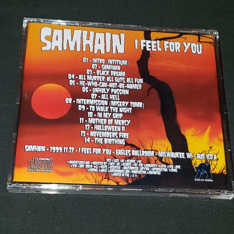 K&ouml;nnte beinhalten: Ein CD-Geh&auml;use mit schwarzem und rotem Hintergrund, auf dem eine dunkle Silhouette eines Baumes zu sehen ist. Der Text "SAMHAIN I FEEL FOR YOU" ist in Wei&szlig; auf dem Geh&auml;use aufgedruckt. Die CD tr&auml;gt den Titel "I Feel For You" und wurde am 27. November 1999 live im Eagles Ballroom in Milwaukee, Wisconsin, aufgenommen.