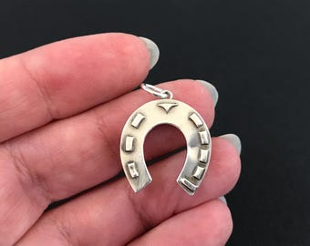 Antique sterling silver puffy Lucky Horseshoe pendant or charm